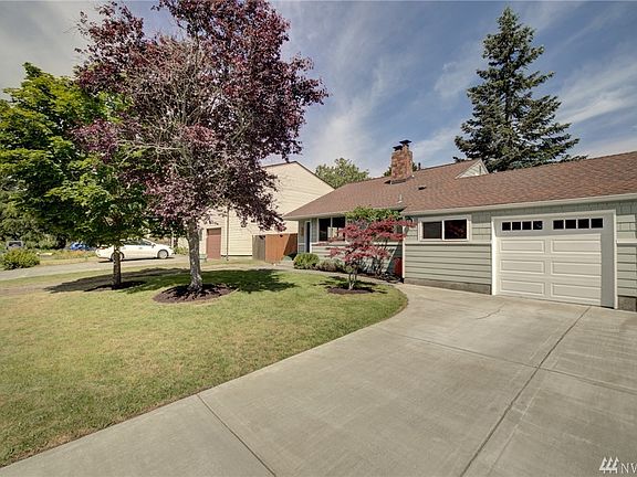 Abundant off street parking, oversized single car garage with storage, newer siding and garage door