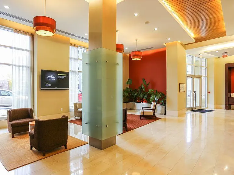 Building lobby w/ secured access, front desk concierge, mail room, and Amazon Hub