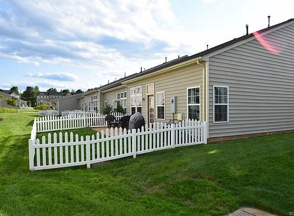 A Rare Find, a fenced yard and an end unit.  You will love this townhome!