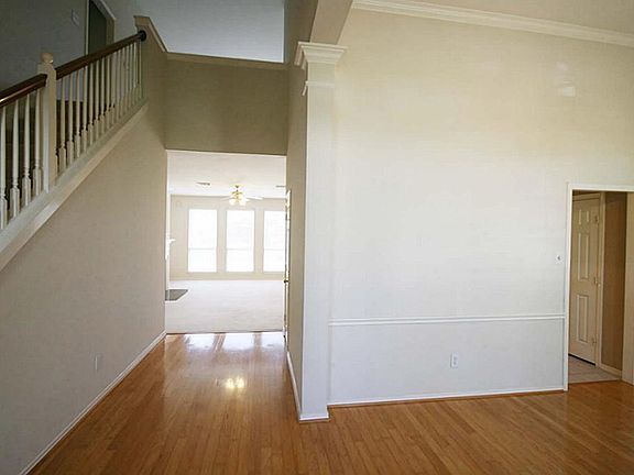  ENTRY - Pretty hardwoods in the entry and dining room greet you as you enter the home.