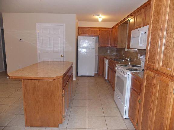 Kitchen & with Laundry Room