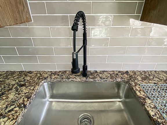 kitchen sink and quartz counters
