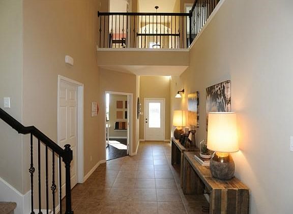 Photo of Model Home with Same Floor Plan, Not of Actual Home Listed