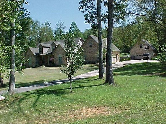 Front view of home and detached garage