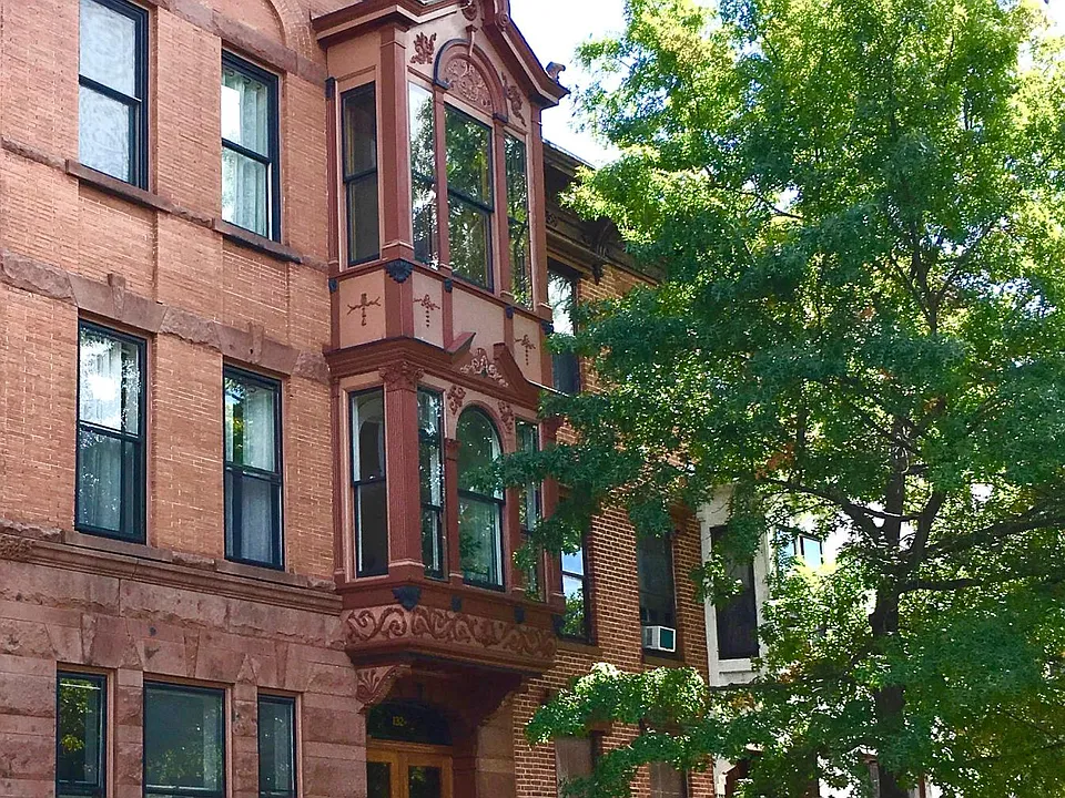 The front of this elegant apartment building. You pick your mail and packages up in the safe upstairs vestibule.