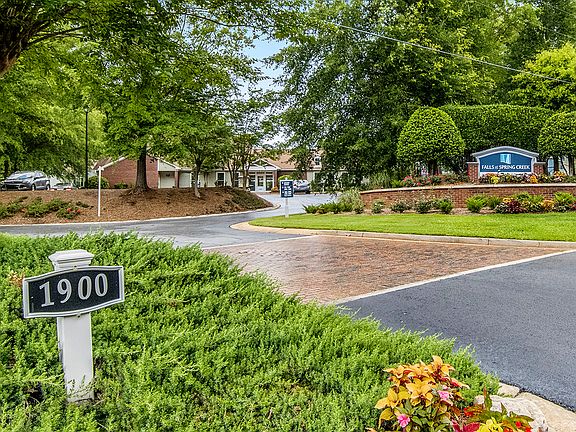 Entrance sign to Falls at Spring Creek apartments for rent in Macon, GA