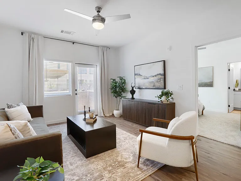 Relaxed, refined living. The B2 is designed to live as good as it looks, with the living room offering generous proportions, patio access, and a clean sight line to the primary suite.