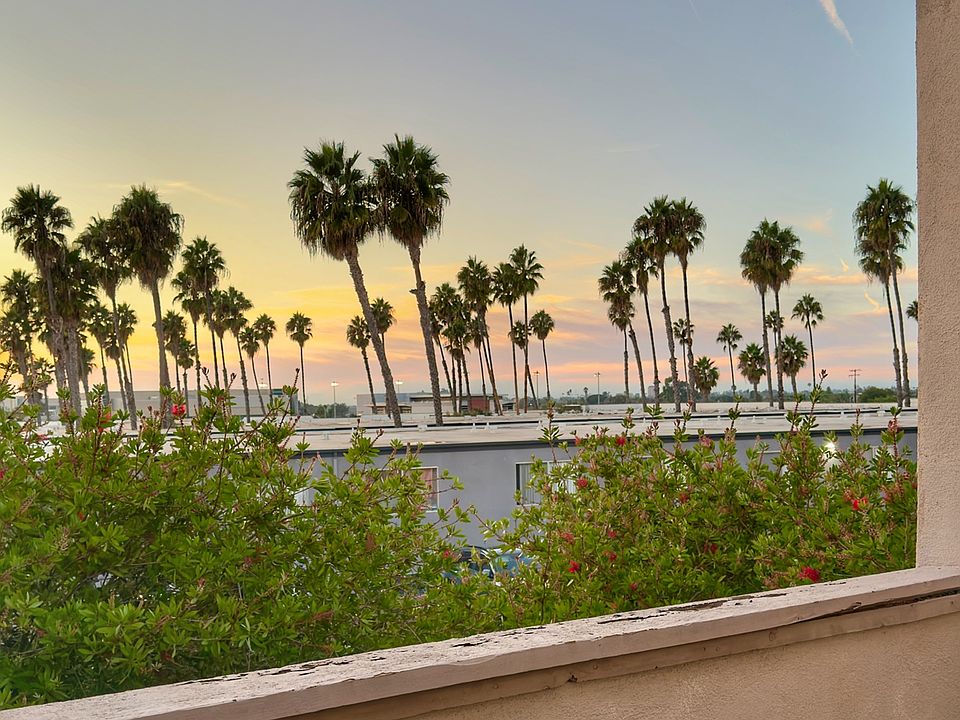 Facing west, enjoy beautiful treetop and distant sunset views.