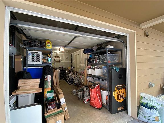 Garage + BONUS outdoor designated parking spot!