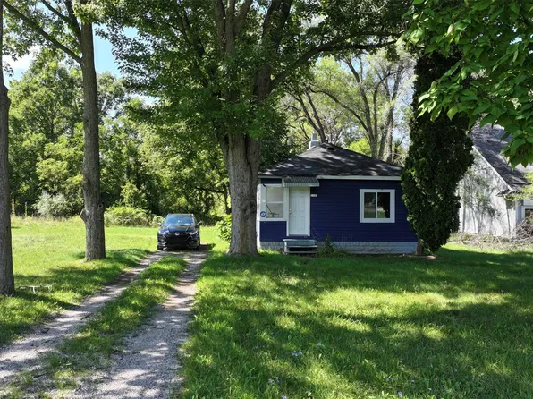 1192 S Belsay Rd, Burton, MI 48509