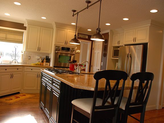 Custom kitchen with large granite island, Stainless steel appliances