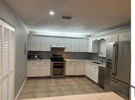 9633 Riverside Dr, Coral Springs, FL