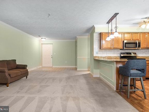 5th image of 633 Admiral Dr Unit 206