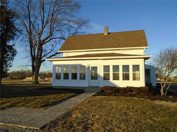 This 2 or 3 bedroom home has 29 x 8 glass enclosed porch.