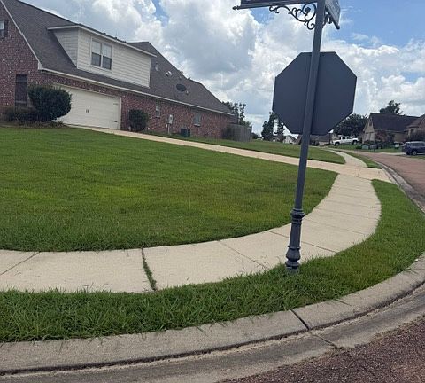 Entrance to driveway, right side of Home