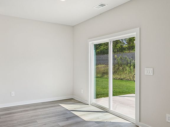 The open-concept floorplan allows for an easy flow between the kitchen and dining areas.