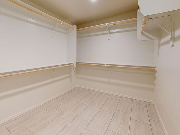 Master Bedroom Walk in Closet.