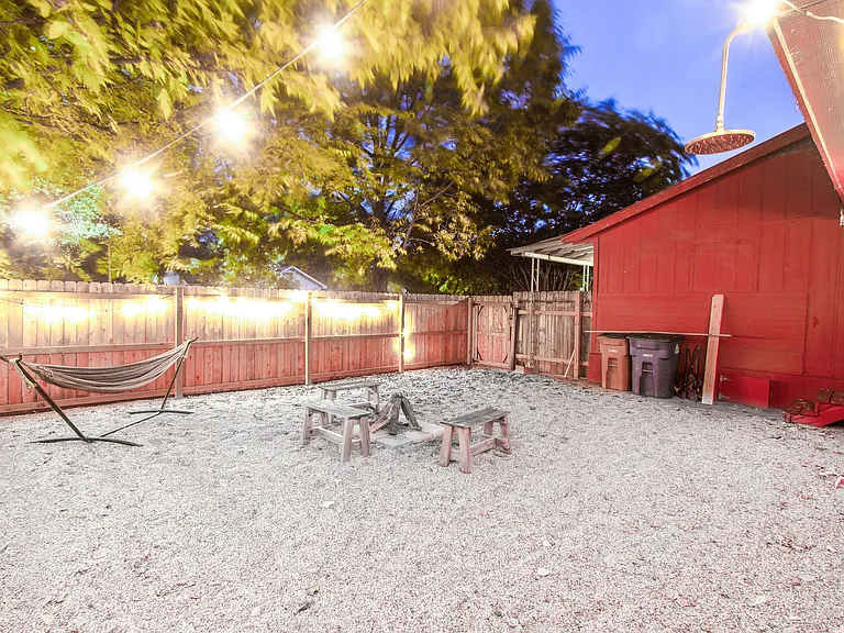 Fenced in yard looking toward front