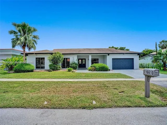 16610 Royal Poinciana Ct — Photo 1