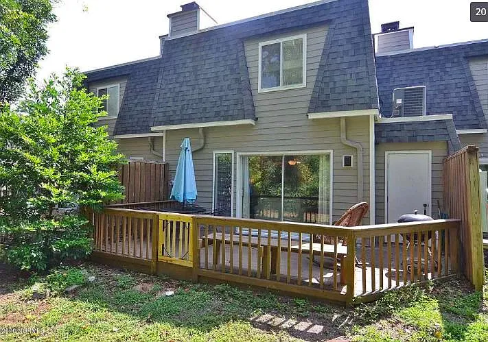 Private outdoor deck with patio furniture