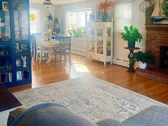 The living room and open dining area