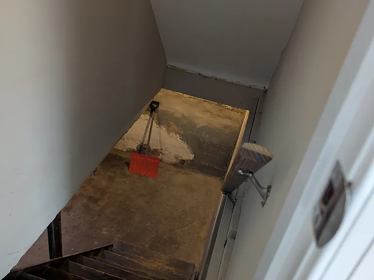 Stairs to basement. Washer and dryer are located in the basement
