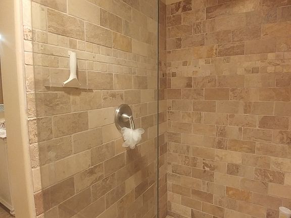 Shower in lower bath