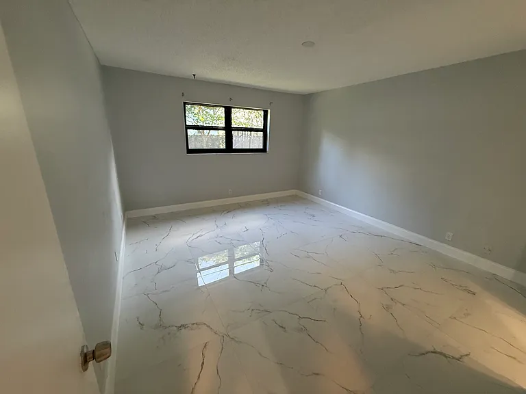 9150 NW 38th Dr #106 — Photo 24