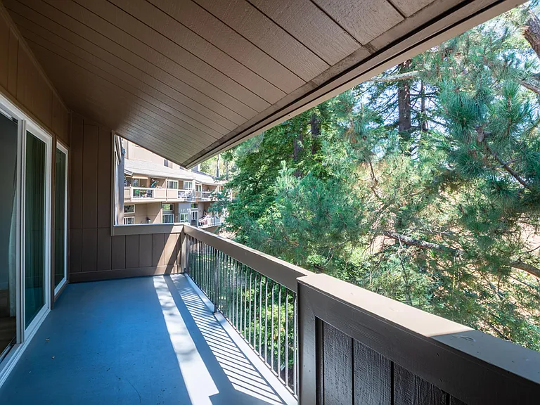 Large tree top balcony with room to create lovely indoor/outdoor living space.