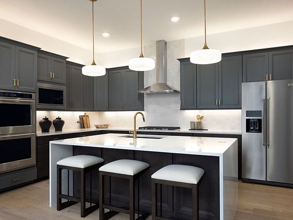 Spacious Kitchen with Waterfall Island