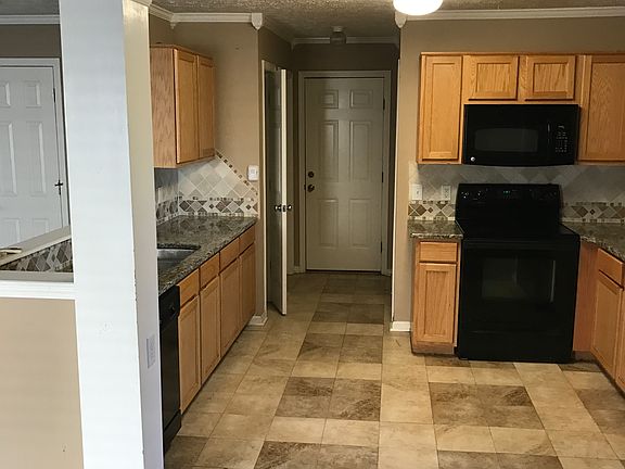 Nice open kitchen with walk in laundry room