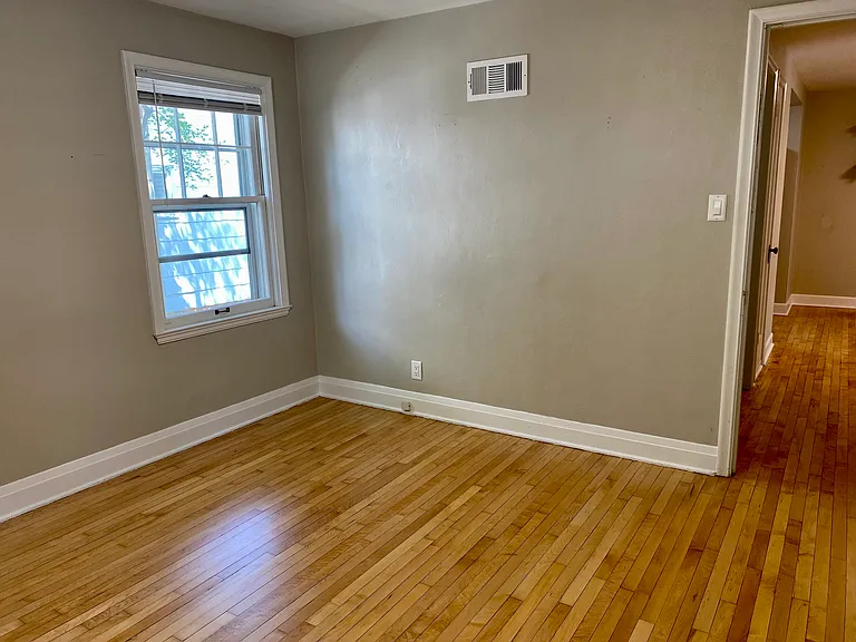 Bedroom Two - Spacious with maple flooring