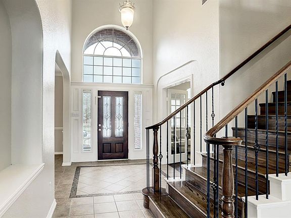 Immediately when you enter you are greeted with a foyer. To your left is the study and across sits the dining room. Wood look laminate flooring throughout the house.