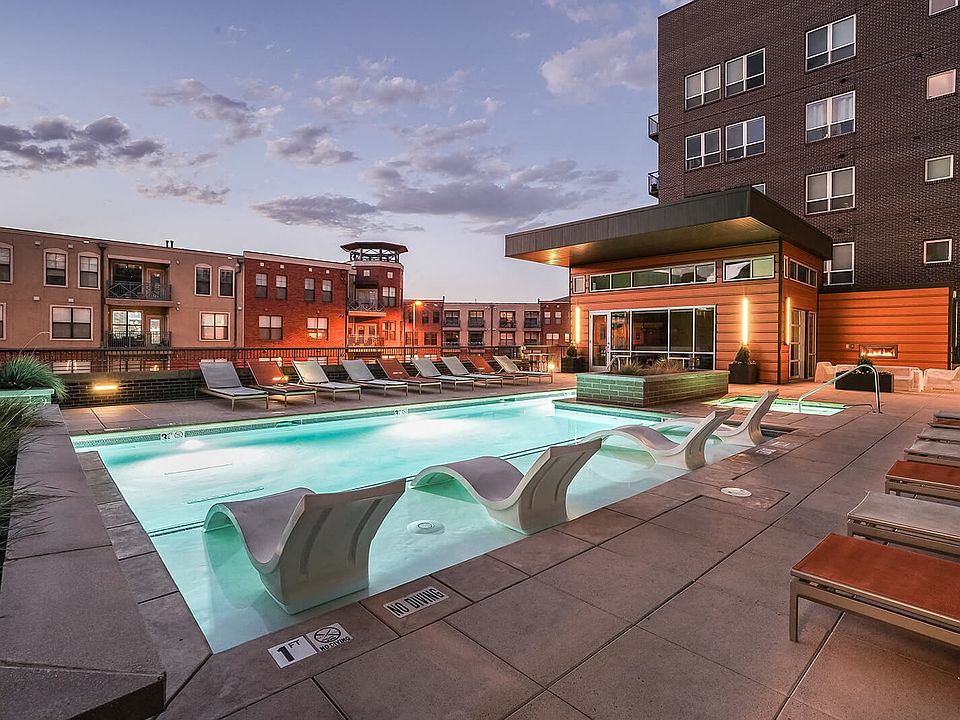 Resort style outdoor pool courtyard with year round spa