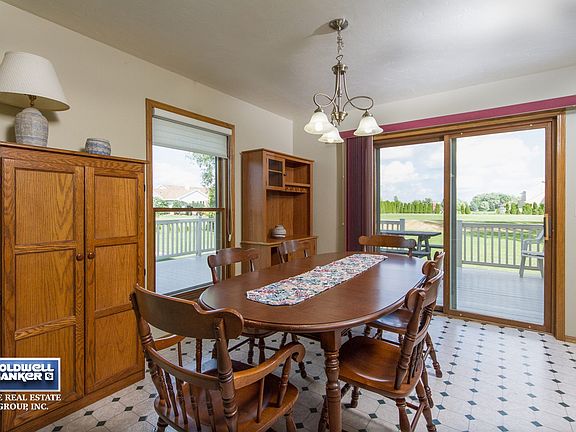 Dining Area With Patio Doors To The Back Yard