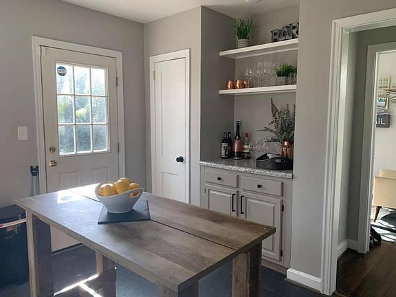 updated kitchen with slate floors & new back door