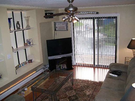 Living Rm with Slider to Balcony