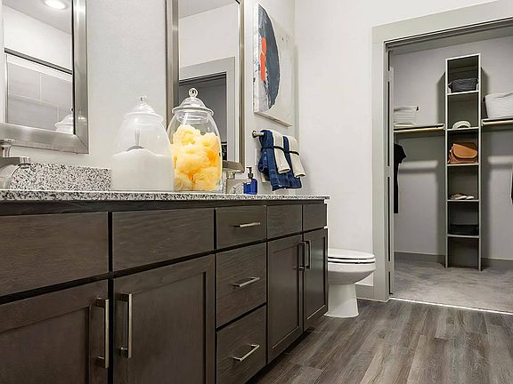 Spacious Bathroom Featuring Two Separate Mirrors Above Vanities