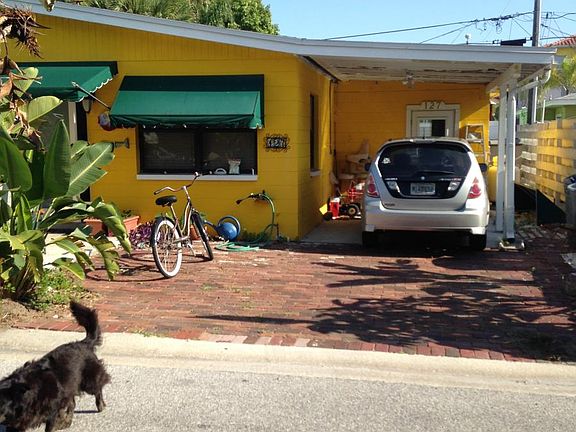 Carport can easily accommodate 2-3 compact cars.