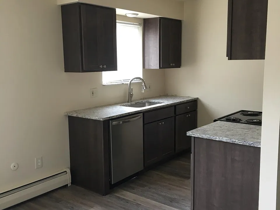 New Kitchen w/ granite and stainless appliances ( stove, refrigerator and dishwasher)
New laminate floor.
