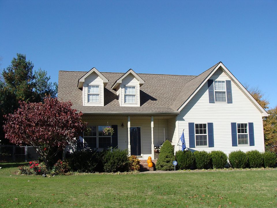Front of home situated on large lot