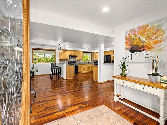  Richly finished Brazilian Tigerwood floors throughout most of the main floor.