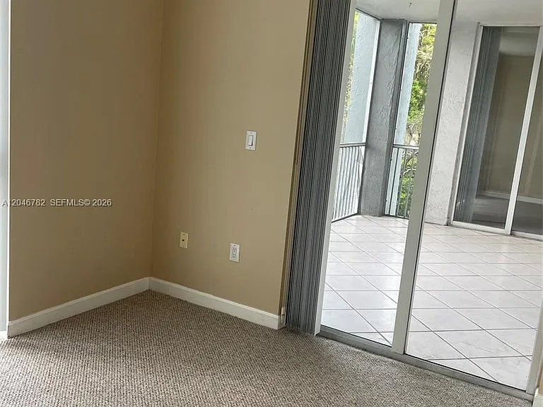 9725 NW 52nd St #210 — Photo 5