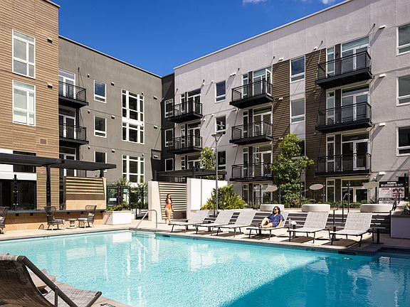 Resort-style pool next to oversized spa