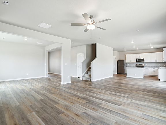 The family room is spacious and has an open concept layout.