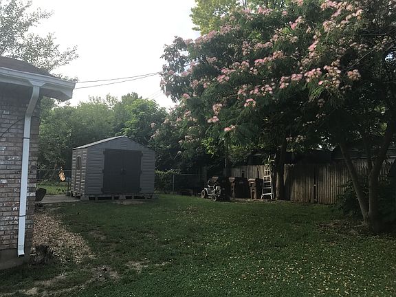 Back yard w/new storage shed