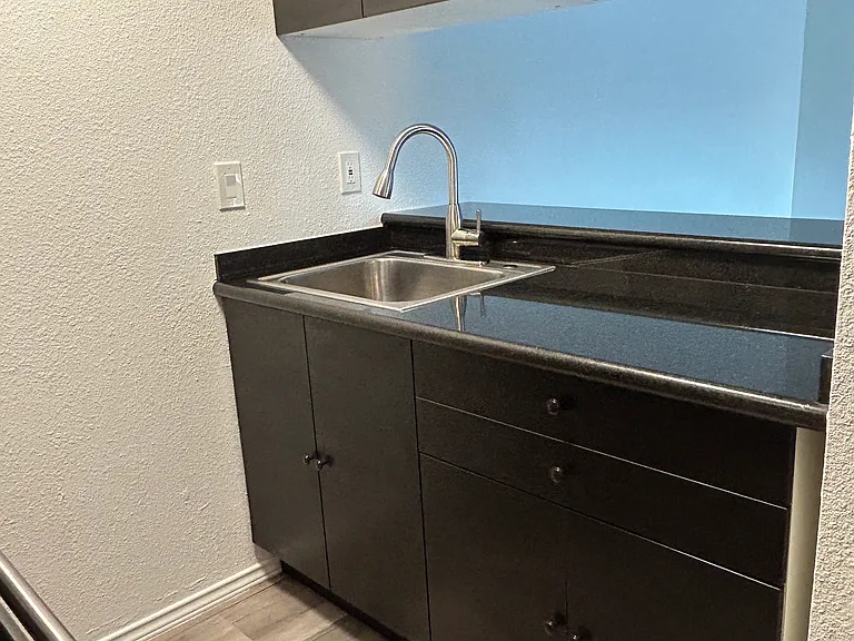 KITCHEN SINK/ COUNTER AREA. 
example of one of our kitchens.