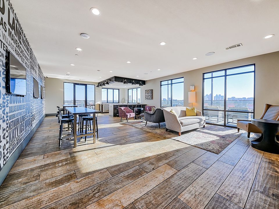 Our rooftop lounge features ample seating and a fire pit.