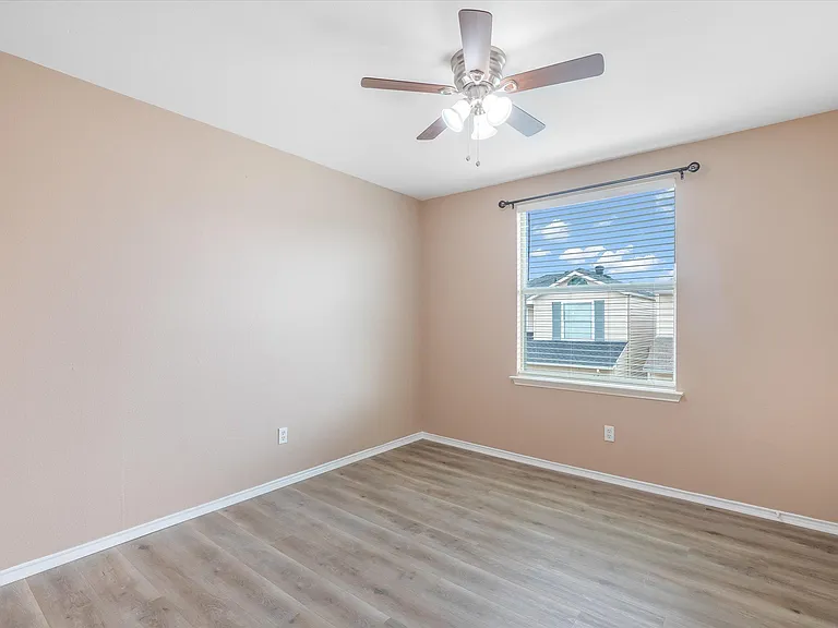 room above garage with walk in closet.