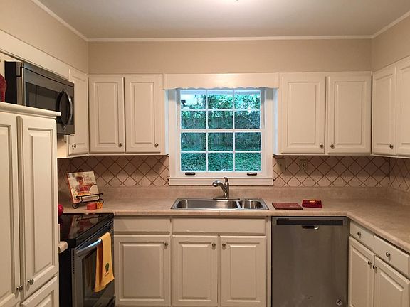 Kitchen with window to backyard
